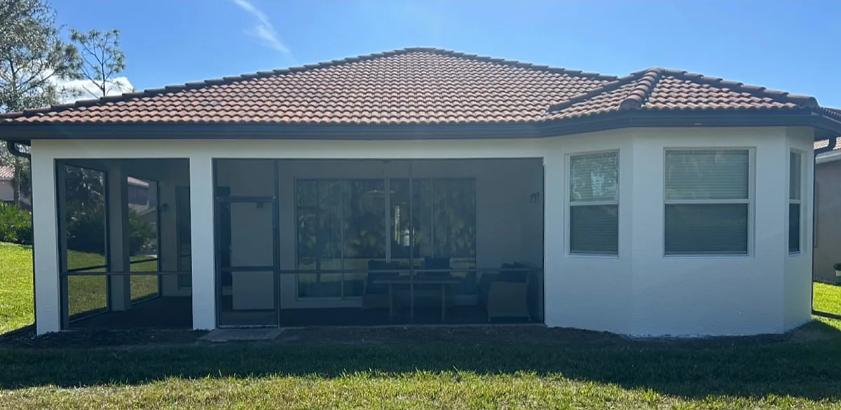 Home rear elevation repainted bright white with fresh trim